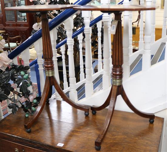 A pair of mahogany tripod tables